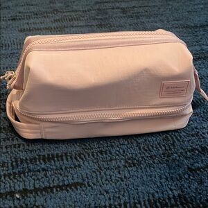 Lululemon dual compartment toiletry bag in pink